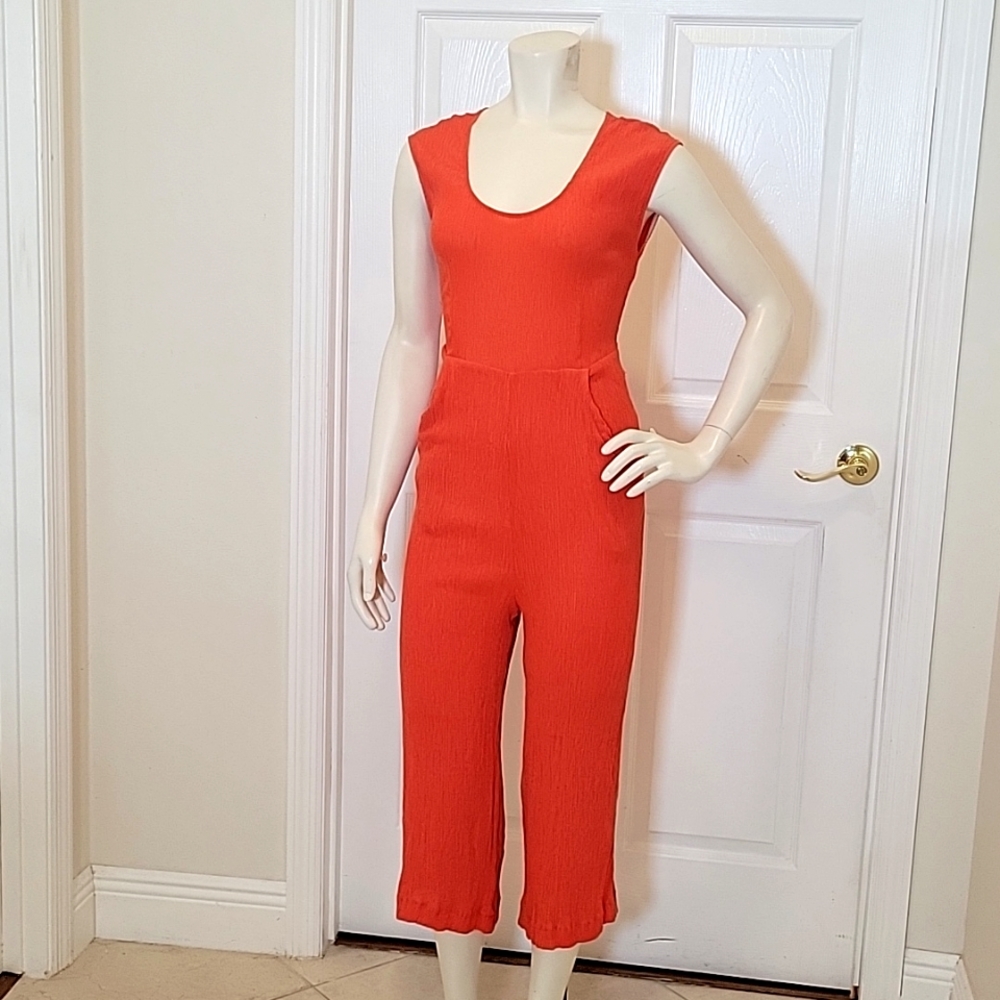 Anthropologie orange jumpsuit size 6
